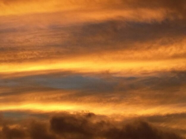 Low angle view of dramatic sky during sunset