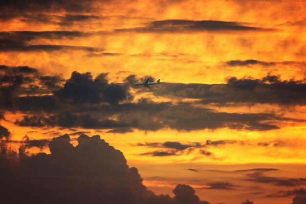 Low angle view of dramatic sky during sunset