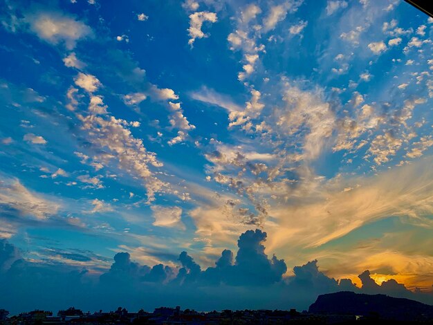 Low angle view of dramatic sky during sunset