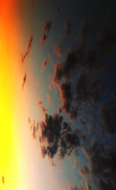 Low angle view of dramatic sky during sunset