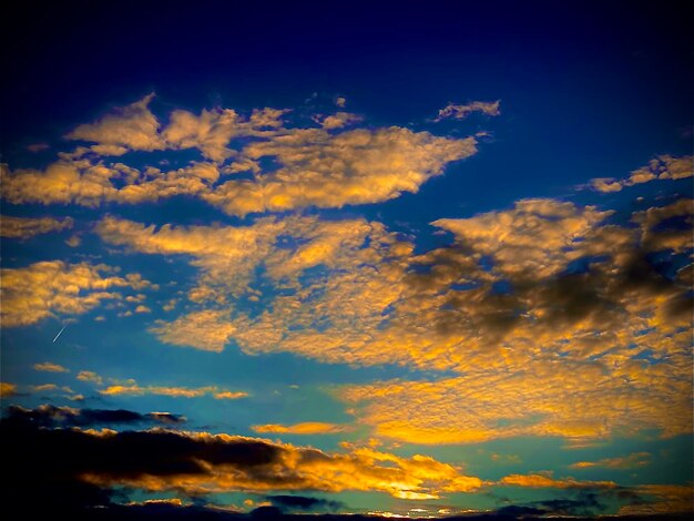 Low angle view of dramatic sky during sunset