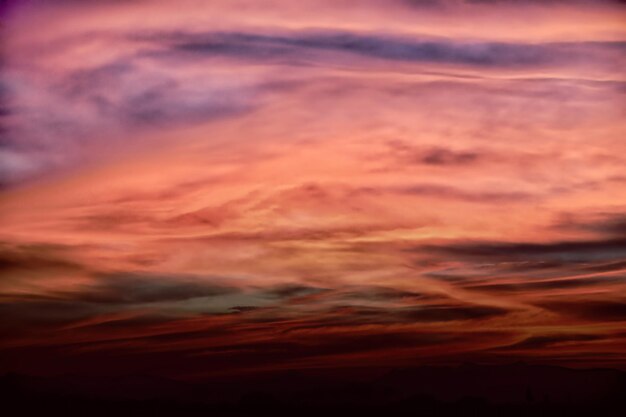 Low angle view of dramatic sky during sunset