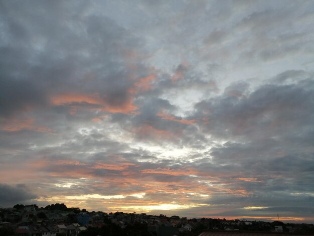 Low angle view of dramatic sky during sunset