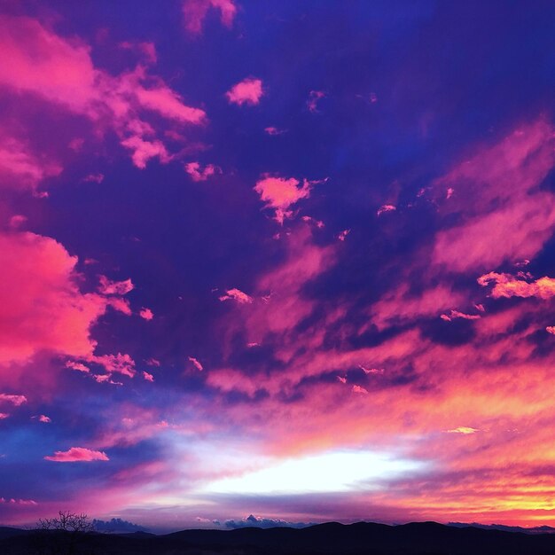 Low angle view of dramatic sky at sunset