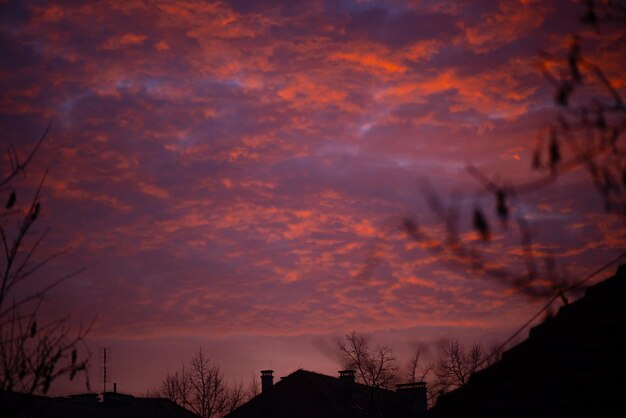 Low angle view of dramatic sky during sunset