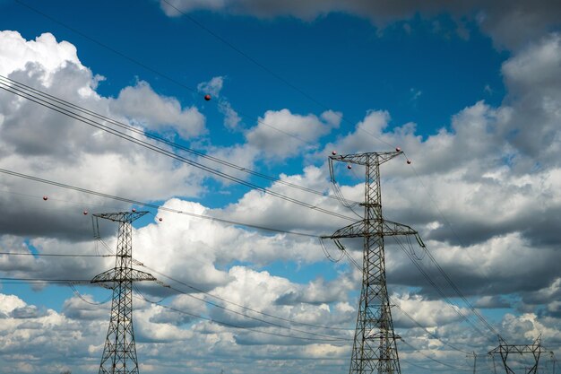 Low angle view of electricity pylon against sky