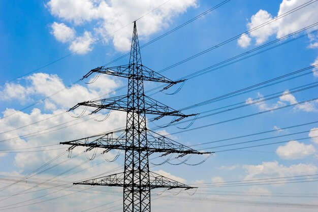 Low angle view of electricity pylon against sky