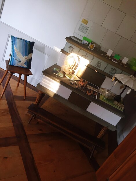 Low angle view of empty chairs and tables at home