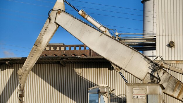 Low angle view of factory against clear sky