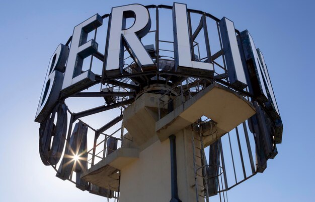 Low angle view of ferris wheel against sky