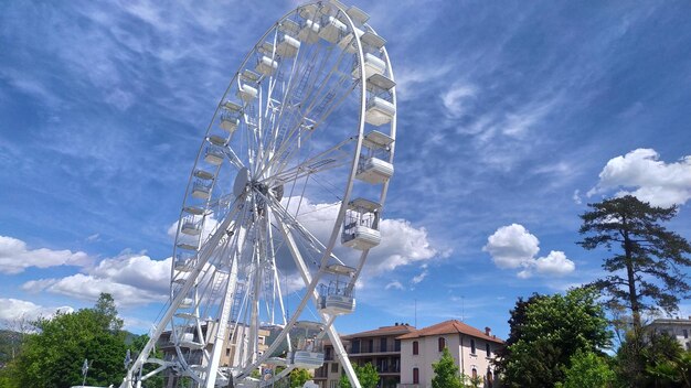 Low angle view of ferris wheel against sky