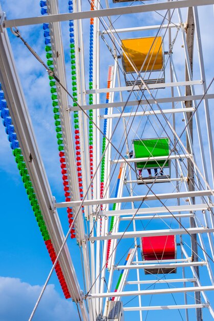 Low angle view of ferris wheel against sky