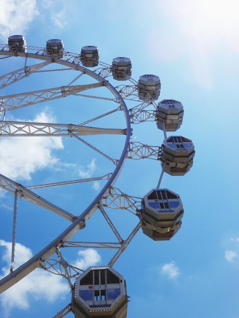 Low angle view of ferris wheel against sky