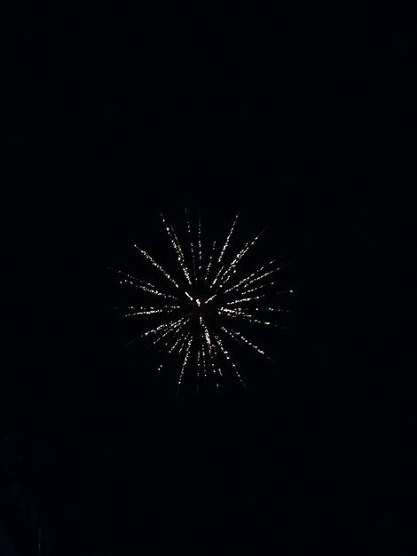 Photo low angle view of firework display at night