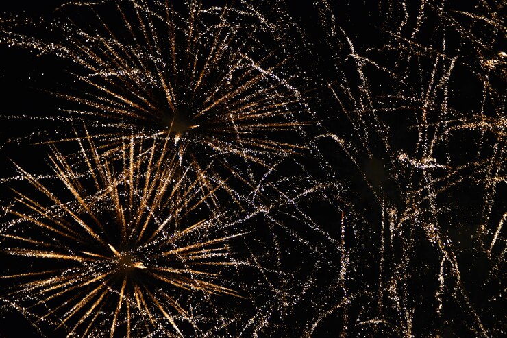 Photo low angle view of firework display at night