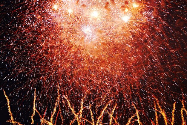 Photo low angle view of firework display at night