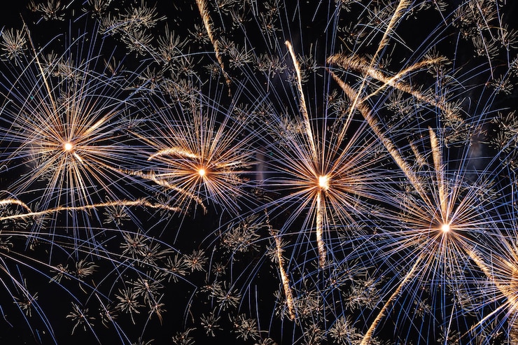Photo low angle view of firework display at night