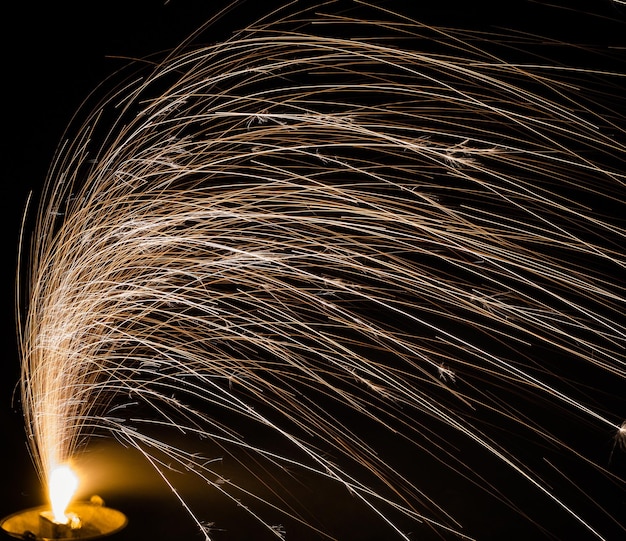 Photo low angle view of firework display at night