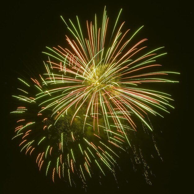 Photo low angle view of firework display at night