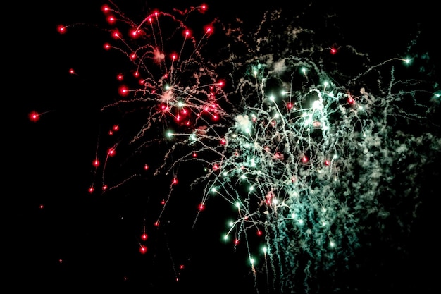 Photo low angle view of firework display at night