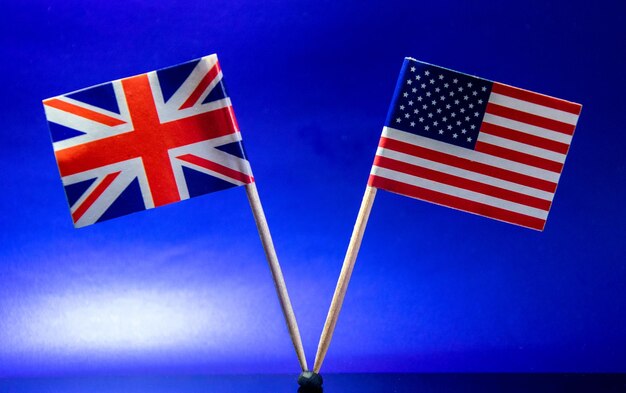 Low angle view of flag against blue sky