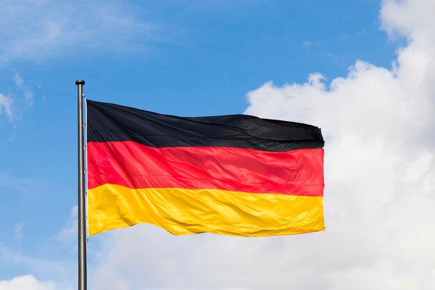 Low angle view of flag against sky