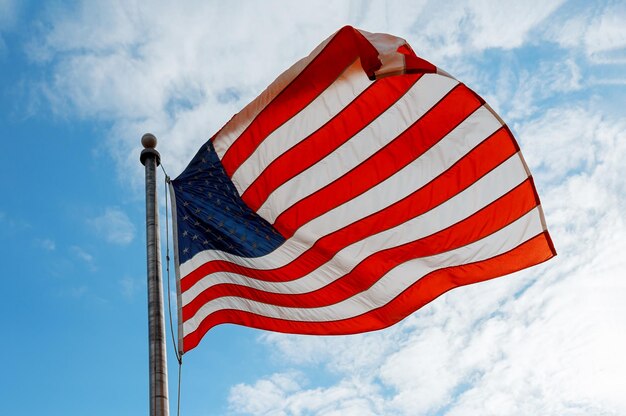 Low angle view of flag against sky