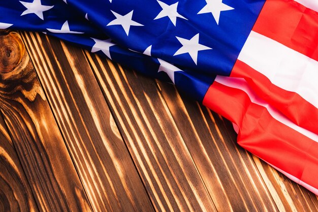 Photo low angle view of flags against blue wall