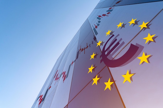 low angle view of flags against clear blue sky