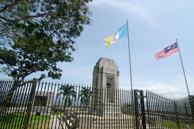 Low angle view of flags against sky