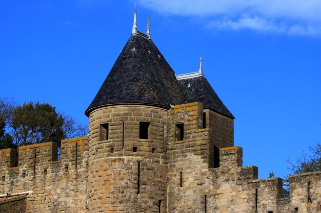 Low angle view of fort against blue sky