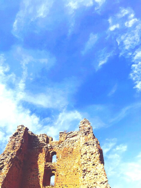 Low angle view of fort against blue sky