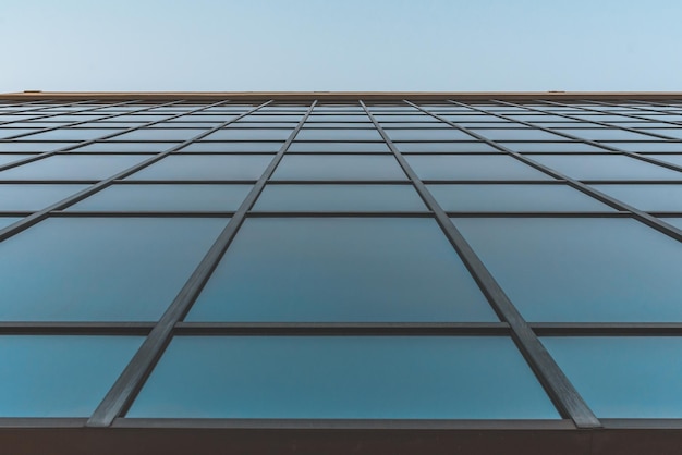 Photo low angle view of glass building against clear sky