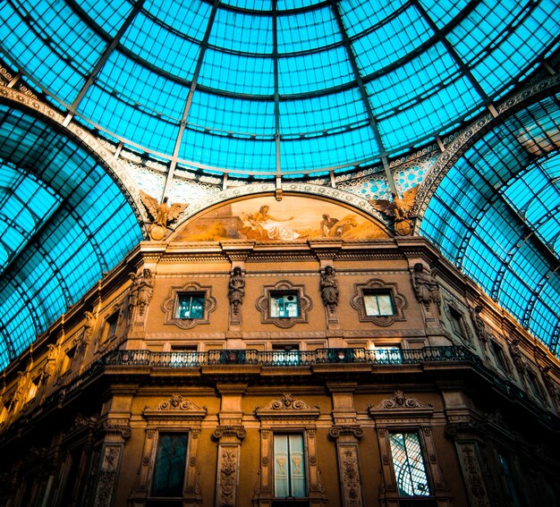 Low angle view of glass ceiling of building