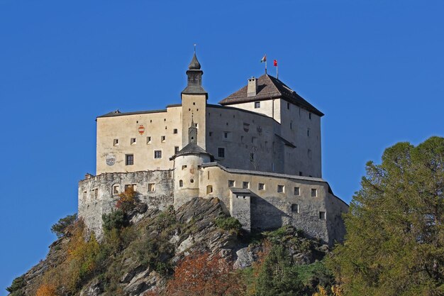 Low angle view of historic building against blue sky