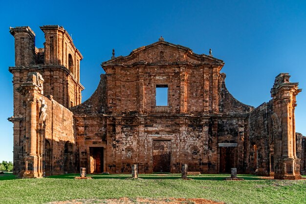 Low angle view of historic building against clear blue sky