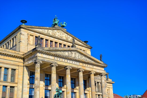 Low angle view of historical building against blue sky