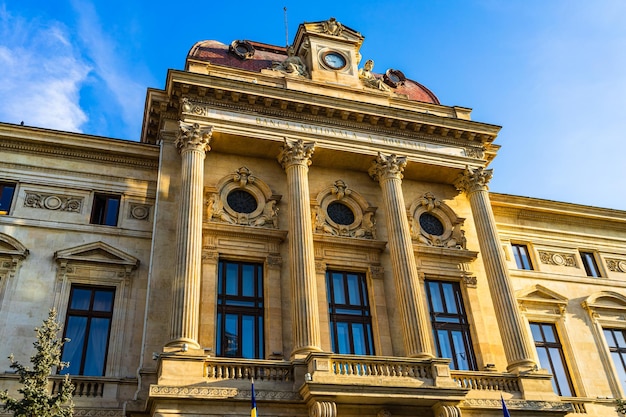 Low angle view of historical building against blue sky