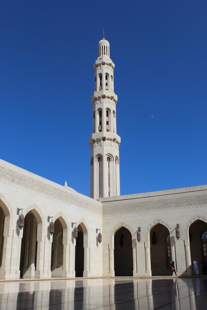 Low angle view of historical building against blue sky