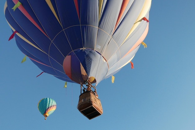 low angle view of hot air balloon flying against sky