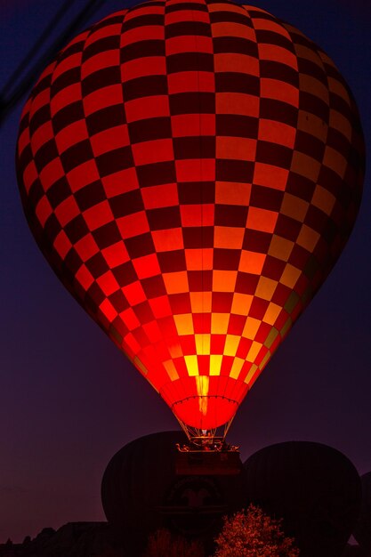 Low angle view of hot air balloon at sunset