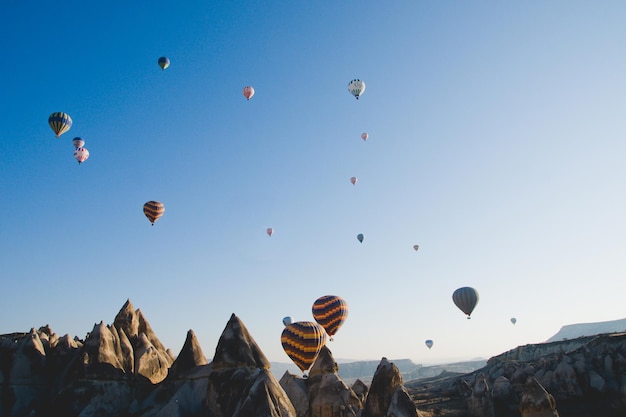 Low angle view of hot air balloons against sky