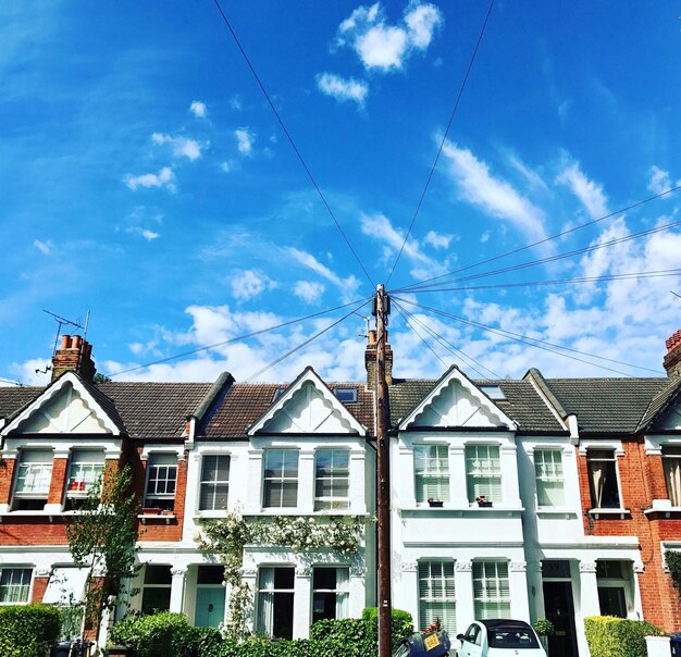 Low angle view of houses against sky