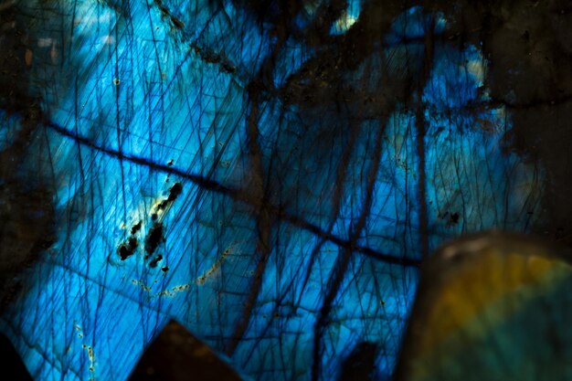 Low angle view of illuminated blue sky at night