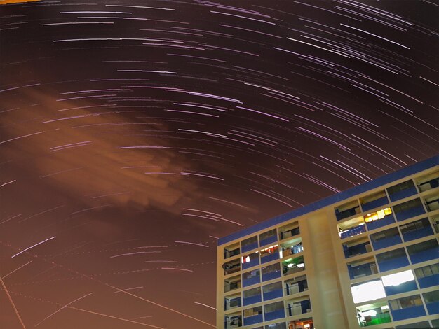 Low angle view of illuminated building at night