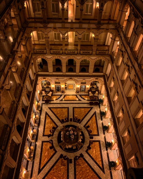 Low angle view of illuminated ceiling of building