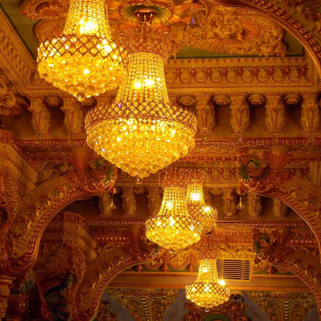 Photo low angle view of illuminated chandelier