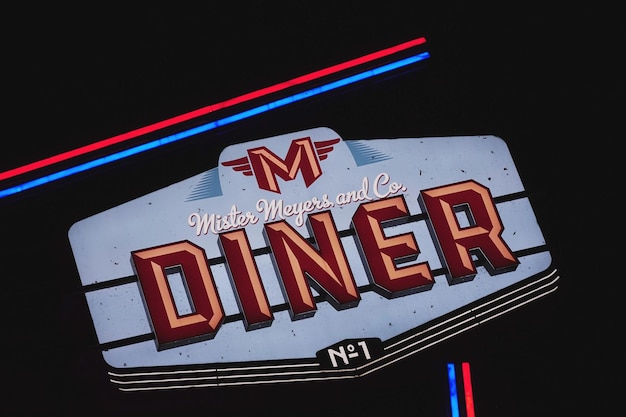 Photo low angle view of illuminated information sign at night