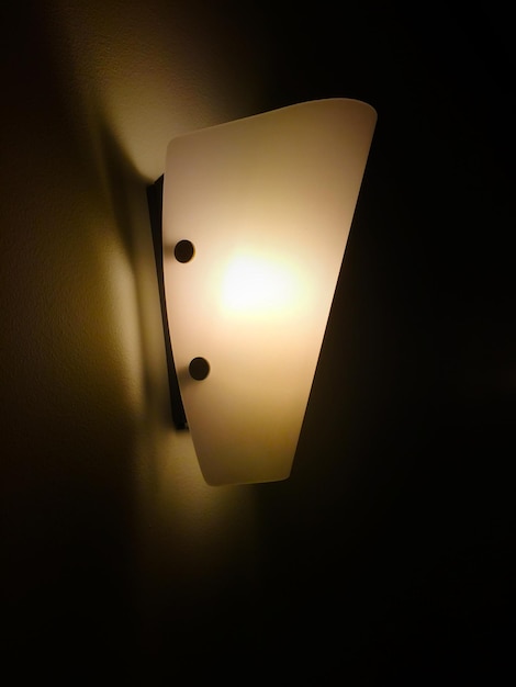 Photo low angle view of illuminated lamp