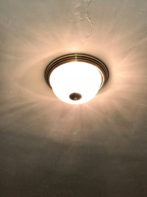 low angle view of illuminated lamp